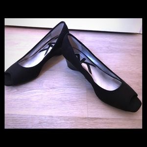 Ann Klein black open-toe shoes.